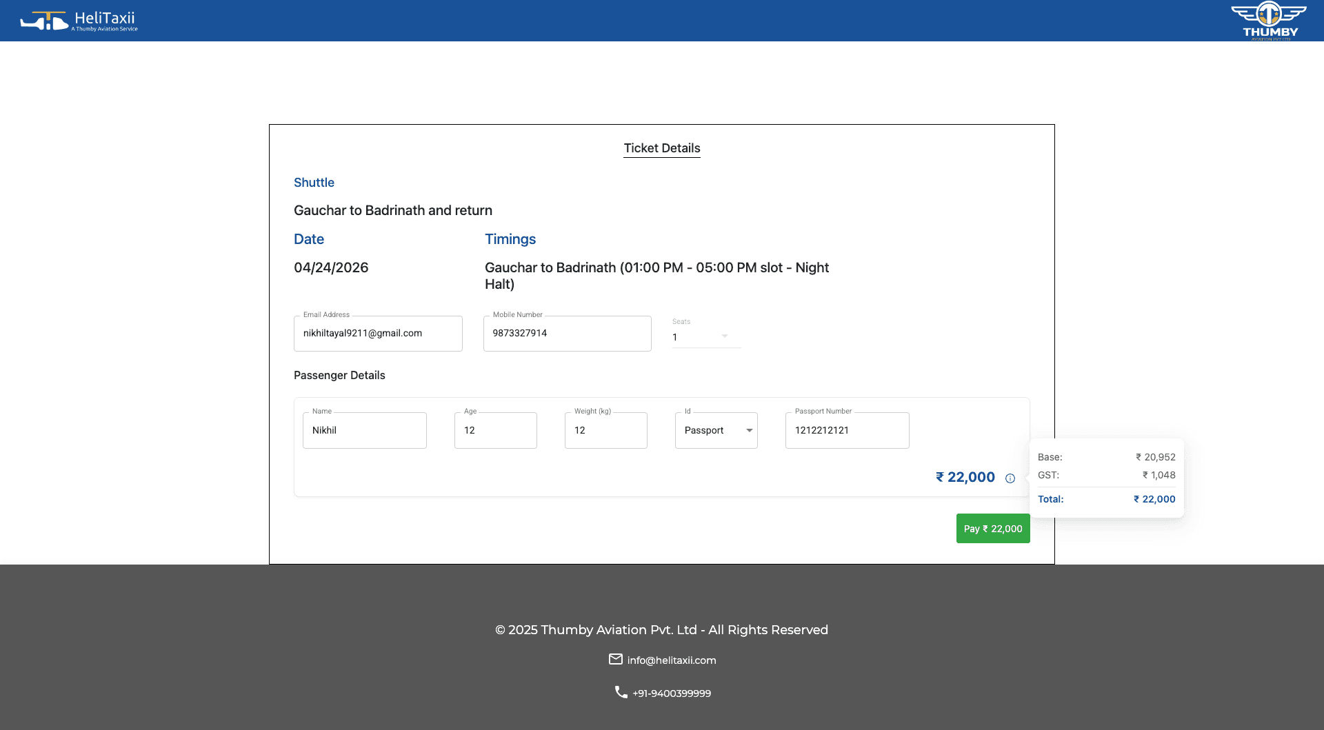 Helitaxii booking — filled passenger details with GST price breakdown and Pay button